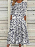 Women¡¯s Half Sleeve Smocked Floral Midi Dress with Pockets